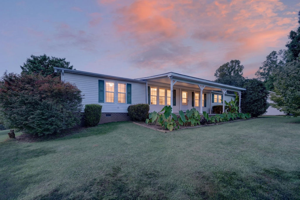 Twilight exterior of 6041 Kaylas Ridge Road in Connelly Springs, North Carolina